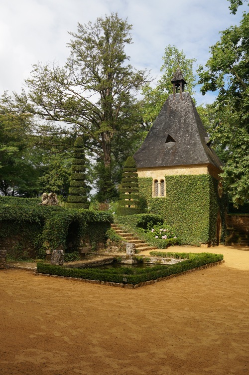Across from the Manor House is a fountain. And stairs. And topiary. And Dovecote. And Chapel. (So much for the eye resting.)