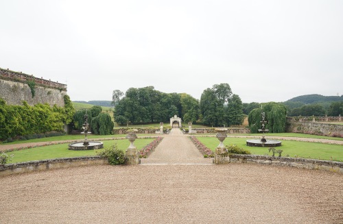 The north-south axis extends from the front door of the house through the Florentine and Service terraces and through the gate and an allee of Chestnuts that once marked the main entry.