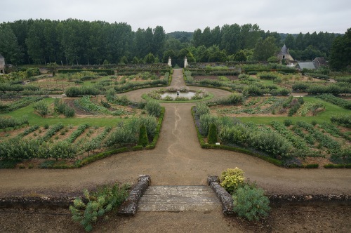 The Potager along the east-west axis, anchored by a fountain that repeats the circular theme.